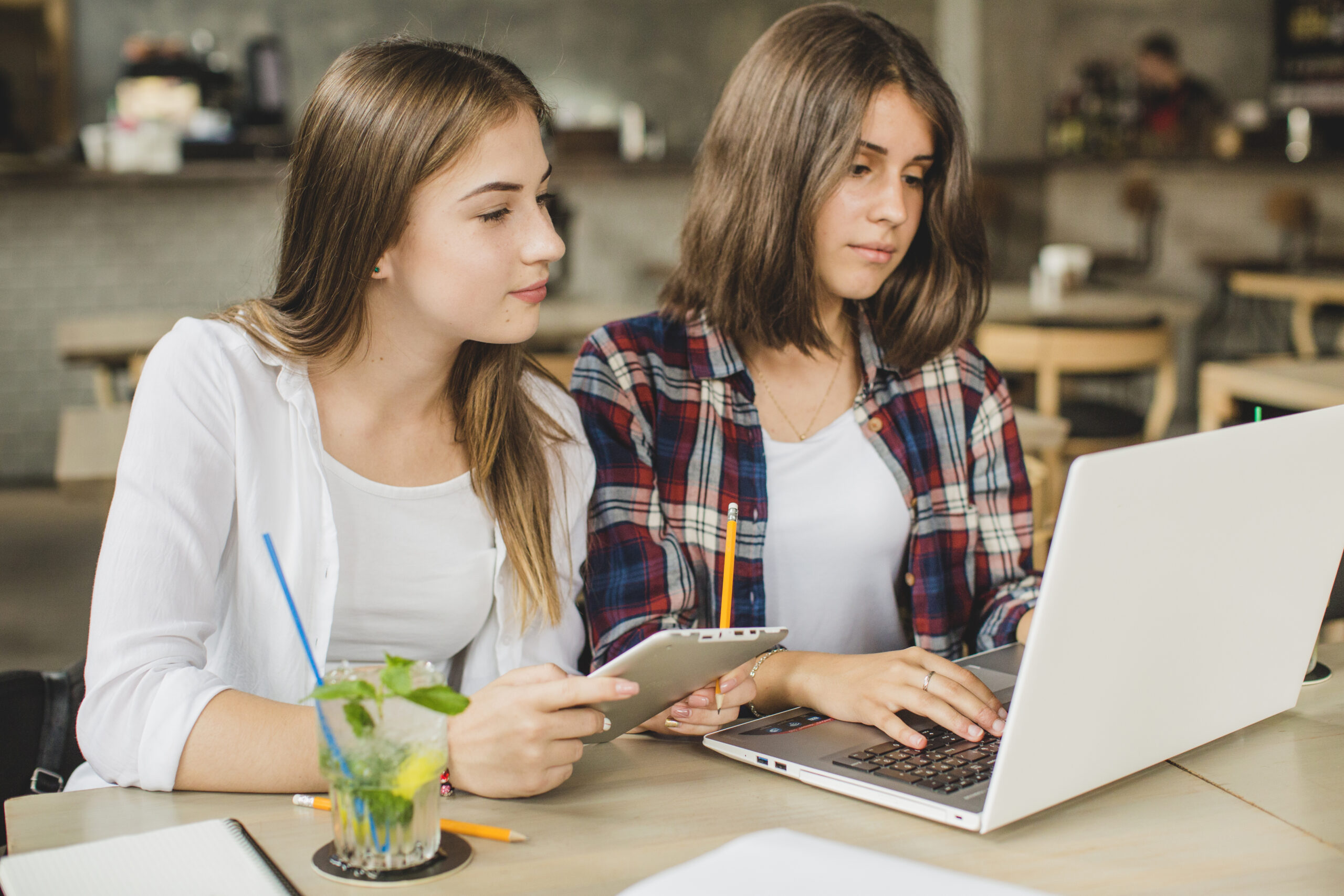 young-girls-watching-laptop-together